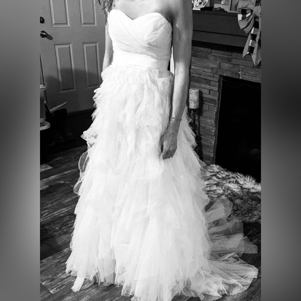 David’s bridal galina wedding dress. Size 2 in soft white.